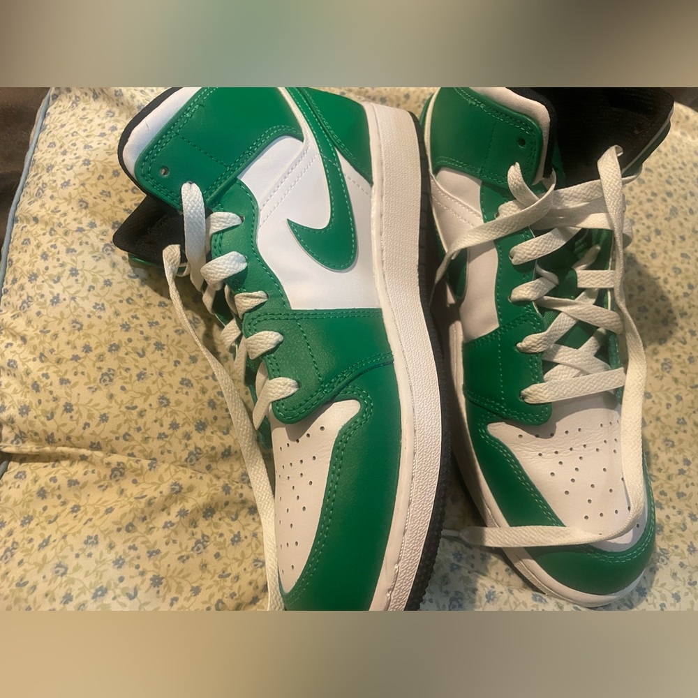 Green and white Jordan’s